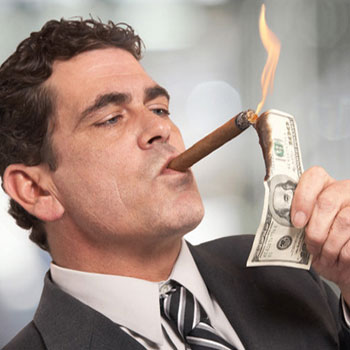 Lighting cash with a cigar